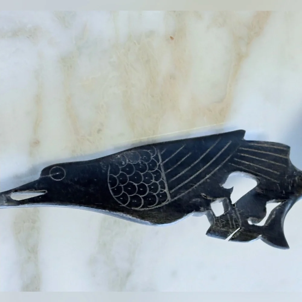 Rare vintage dark horn carved bird serving spoon